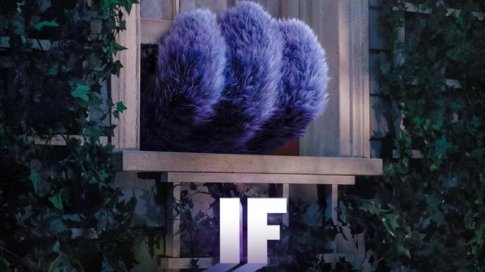 A large purple fluffy hand reaches out from a house window, as if to pull it closed from the inside