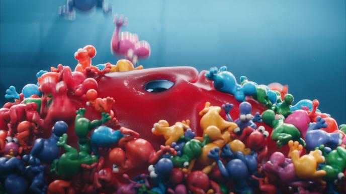 A red gummy monster covered in Nerds candy
