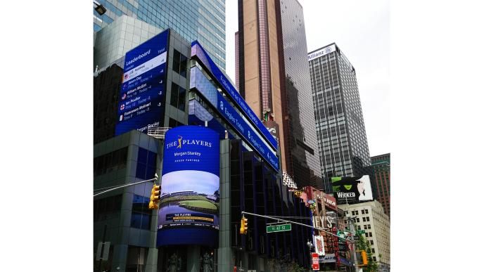 Digital signs in Times Square that display golf stats