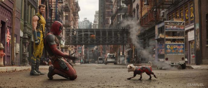 Dogpool walking towards Deadpool and Wolverine