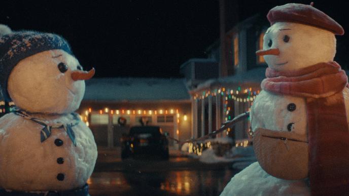 Two snowwomen talk to each other