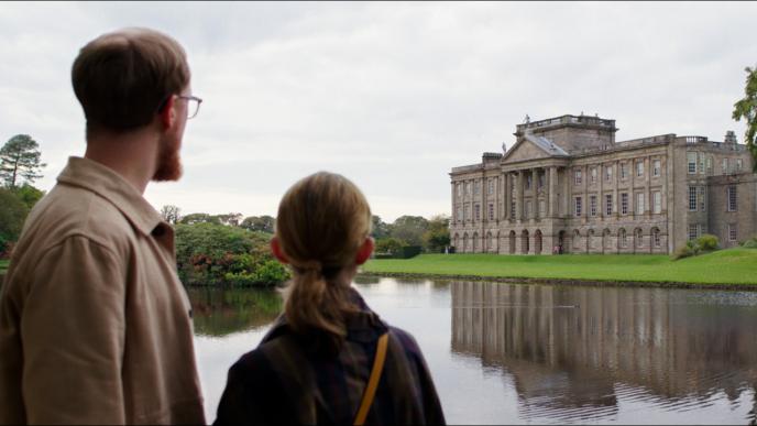 Visit Britain still of family looking over lake
