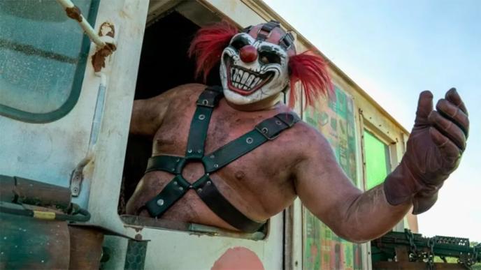 The clown from Twisted Metal s2 hangs out of an ice cream truck window