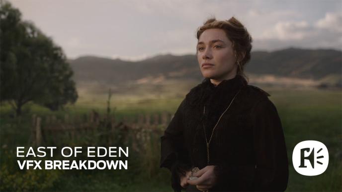 Florence Pugh as Cathy Ames in East of Eden, wearing period clothing and blue hat glances over her shoulder on a historic street, with background figures softly blurred.
