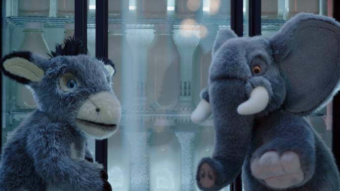 animated stuffed animal donkey and elephant looking towards the camera in a fearful way in an elevator
