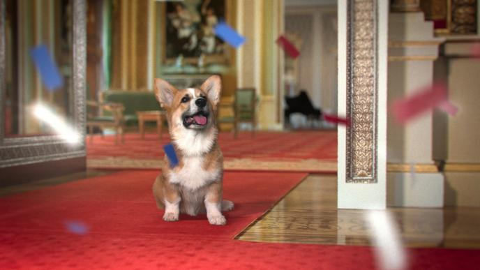 an animated image of a corgi in buckingham palace. confetti falls around it
