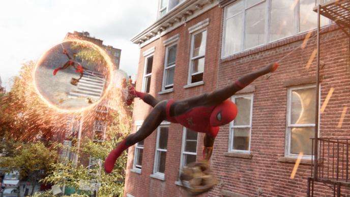 Spider-Man is suspended between magic portals