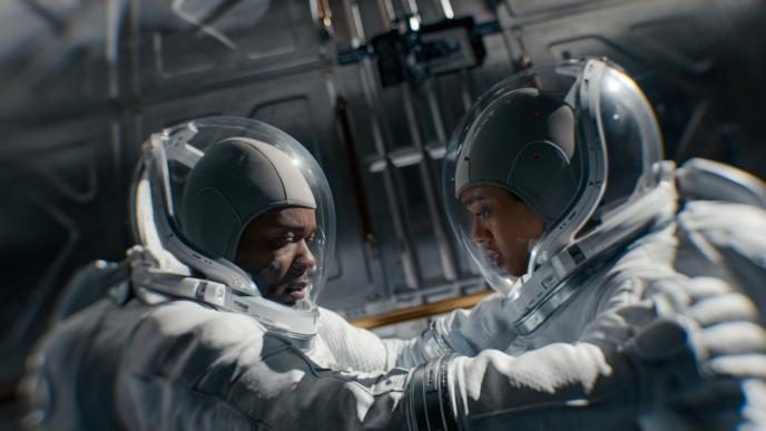 Two astronauts in The Midnight Sky