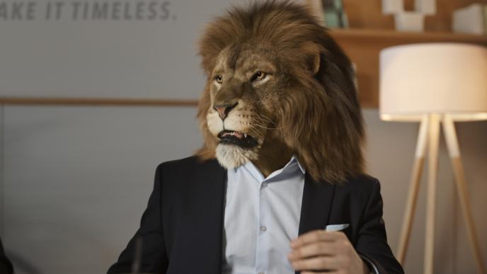 businessperson with the head of a lion