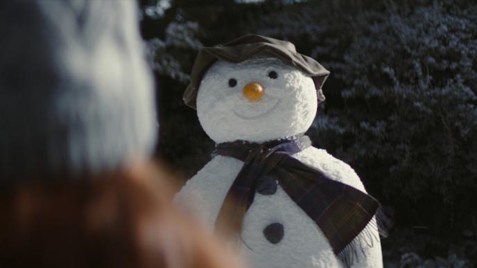 a smiling cg animated snowman