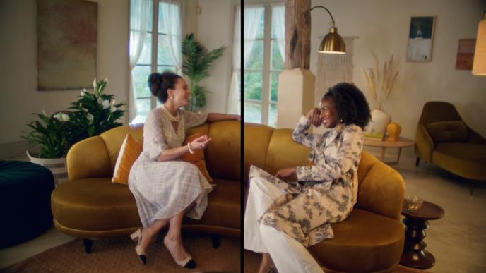 two people chatting on a sofa. the image is split between the middle