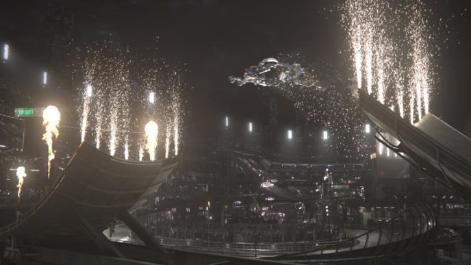 stadium with a bridge split open as fire sparks come out of it