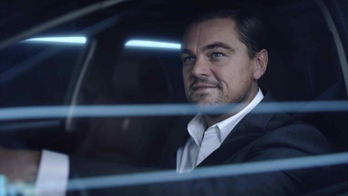 side view of actor leonardo dicaprio in a driver's seat