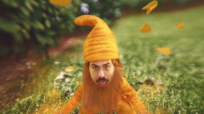 close up view of an animated cheese gnome as cheez-it crackers fly above