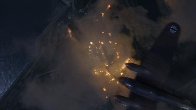 aerial shot of a french battlefield surrounded by a river as a war plane flies above and bombs the site 