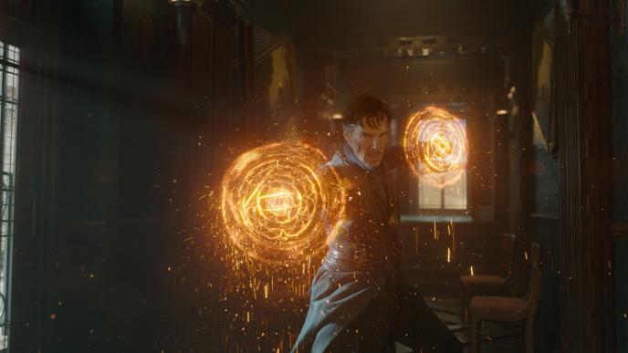 actor benedict cumberbatch as doctor strange with his hands up conjuring magic