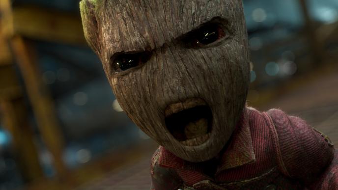 face close up of baby groot angrily shouting