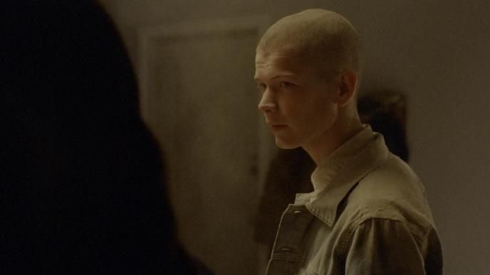 side view of an actor looking to the side