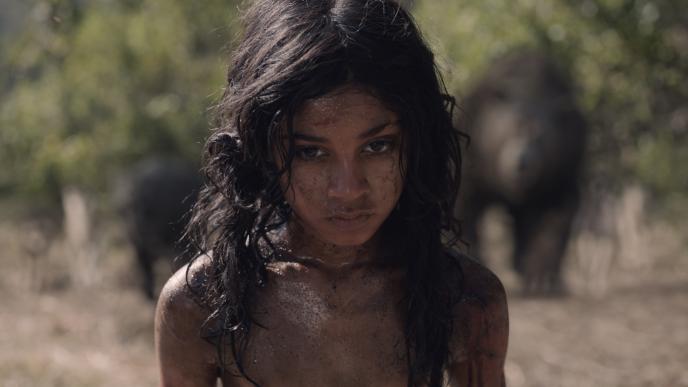 actor rohan chandas mowgli staring directly into the camera