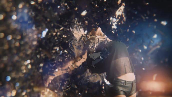 close view of mirrors shattering around singer beyonce as she dances