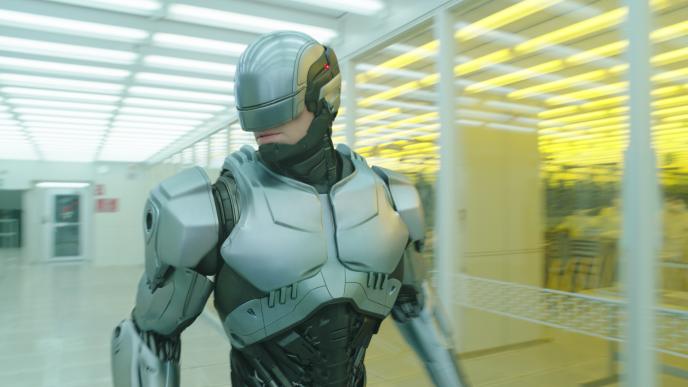 robocop inside a store looking to the left