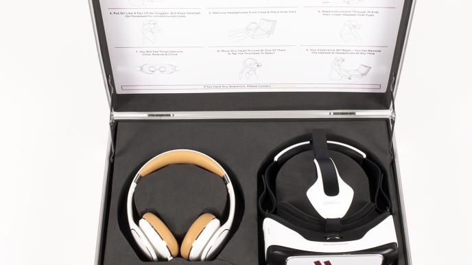 a vr headset and heaphones in a case