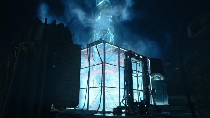 a room build of glass panels lit up as light ascends from the top