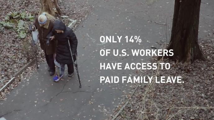 a person helping another who is walking in crutches. there is the text 'only 14% of u.s. workers have access to paid family leave on the right side of the image