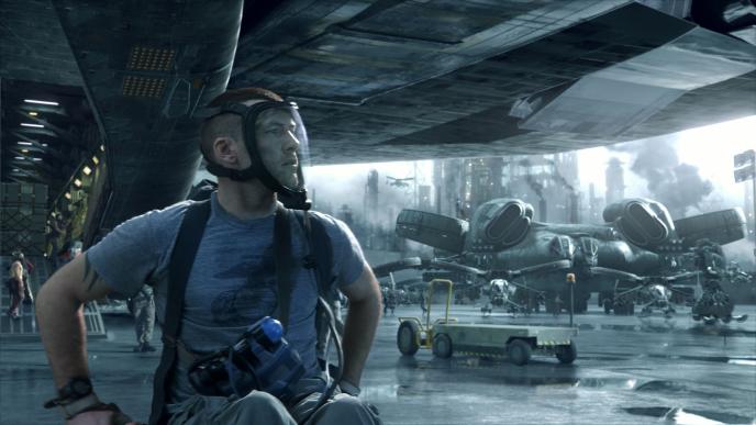 Jake Sully wears his oxygen mask while disembarking onto the compound