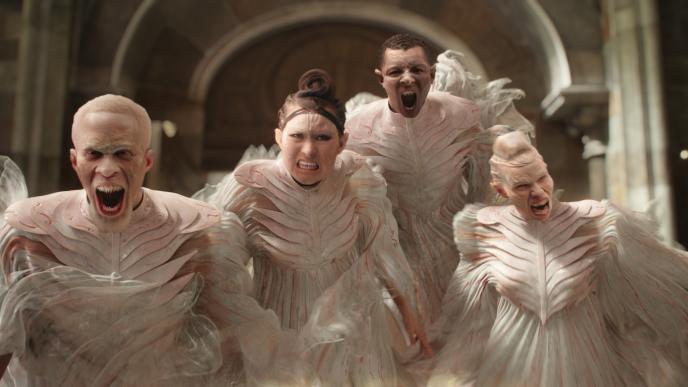 Four fairies approach the screen, threateningly