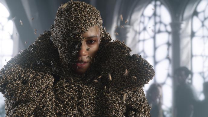 A man, made of bees