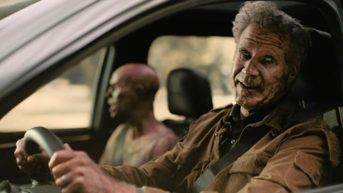A zombie Will Ferrell drives an electric car with a fellow zombie in the passenger side