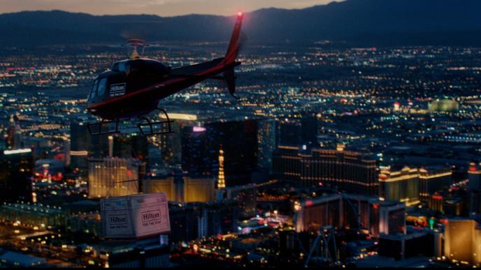 Helicopter flying over buildings 
