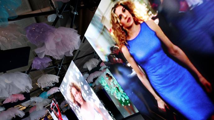 Carrie Bradshaw from 'Sex and the City' displayed on several different screens