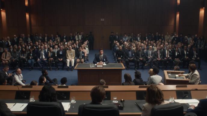 A courtroom full of people during a hearing