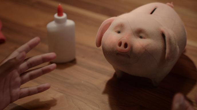 A real life piggy bank gets glued back together