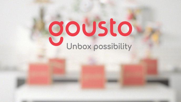 The Gousto logo with the phrase "Unbox Possibility" undernearth