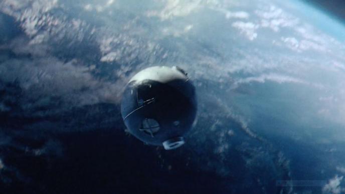 A spaceship orbiting above earth