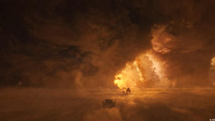 A lone car in a large toxic desert storm