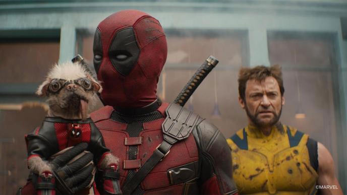 Deadpool and Wolverine - A final shot of Deadpool holding Dogpool, with her eyes enhanced with CG eyes and goggles
