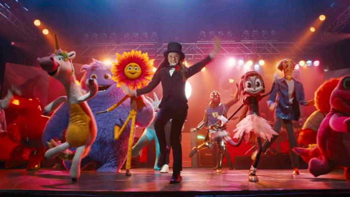 A scene from IF, where a young girl dances with a cast of imaginary friends, created using animation and CGI
