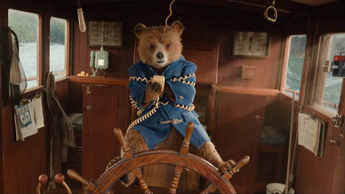 A final shot of Paddington in Peru, Paddington is inside a boat set tied up in cables