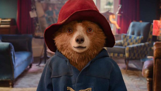 Paddington stands in the Brown's living room, in Paddington in Peru