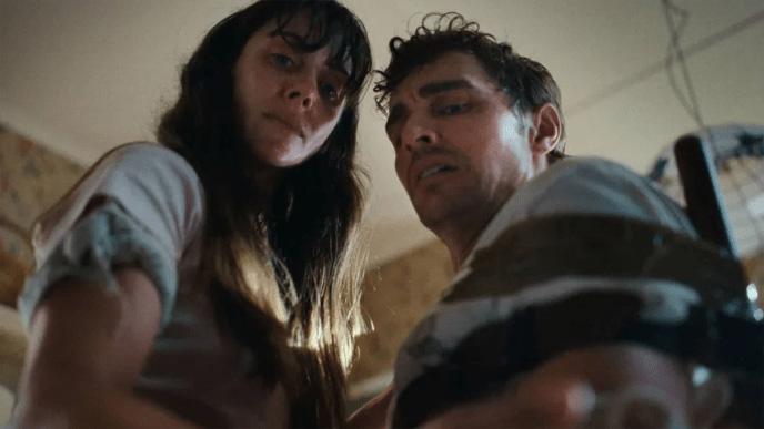 Still from Together film, main characters staring down toward camera