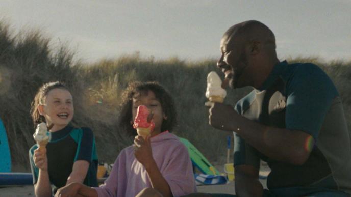 Still from Visit Britain of family on beach