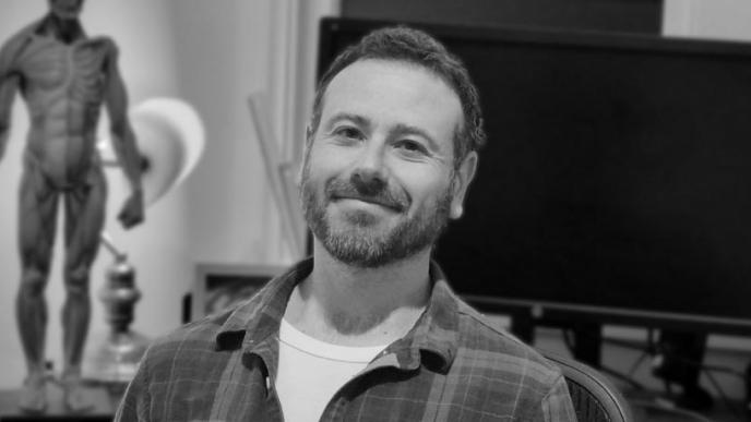 A black and white photo of Avi Goodman