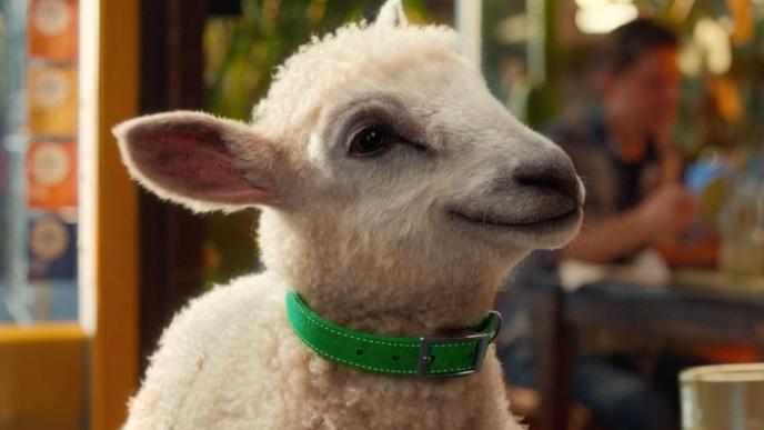 Cox Mobile's CG animated sheep named Annie sits at a bar with her human friend and video calls a friend