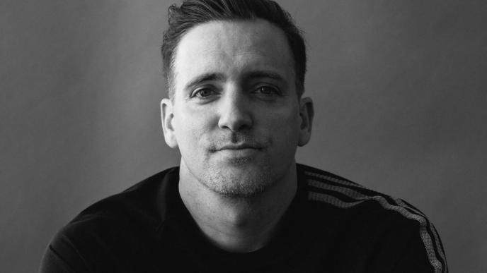 A black and white photo of Executive Creative Director John Likens