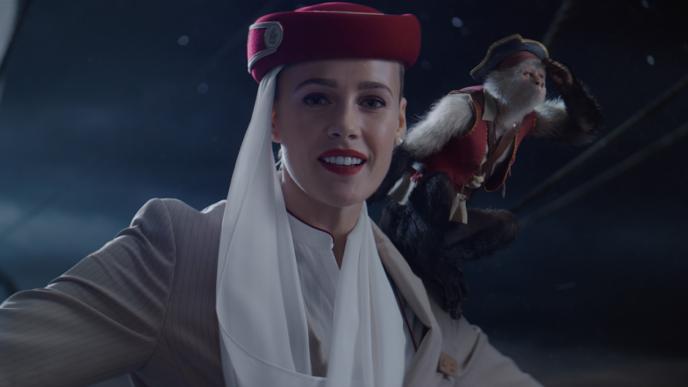Emirates flight attendant with CGI monkey