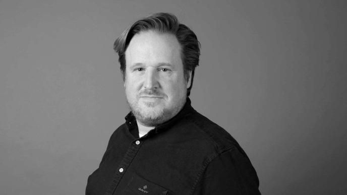 A black and white photograph of VFX Supervisor Christian Manz